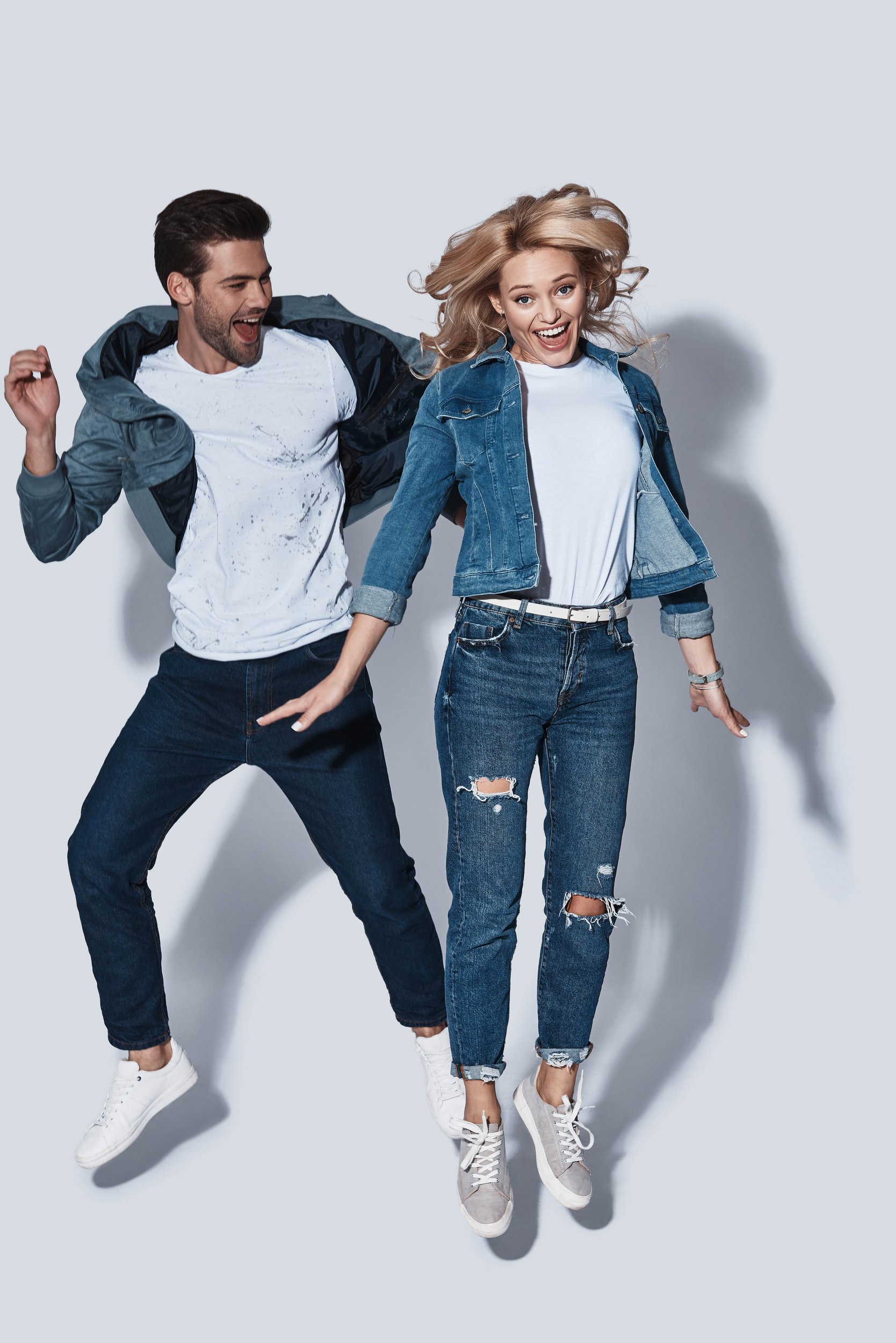 Jeans and shirts of happy couple